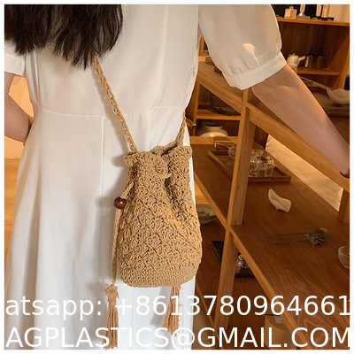 Raffia Paper Rope Crochet Straw Bag for Seaside Vacation Trips Shopping Handmade Large Crocheted Raffia Straw Tote Bag With Stone Closure OEM Bohemian Leather Fashion Women Vintage Casual