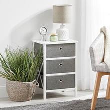 Natural woven basket with plant, 4 gray fabric drawer white end table, lamp, chair, curtains